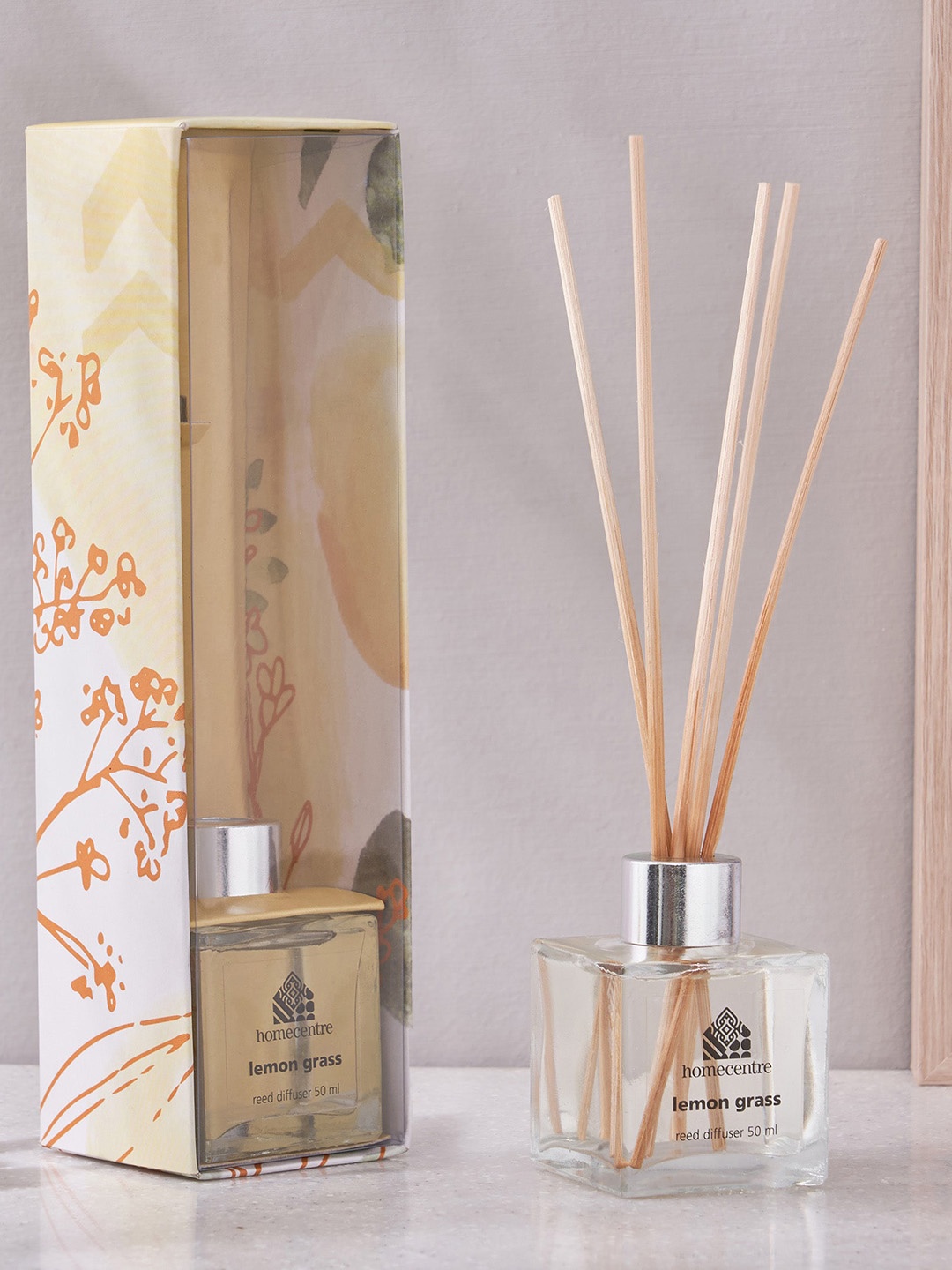

Home Centre Corsica Yellow Lemon Grass Reed Diffuser Set 50 ML