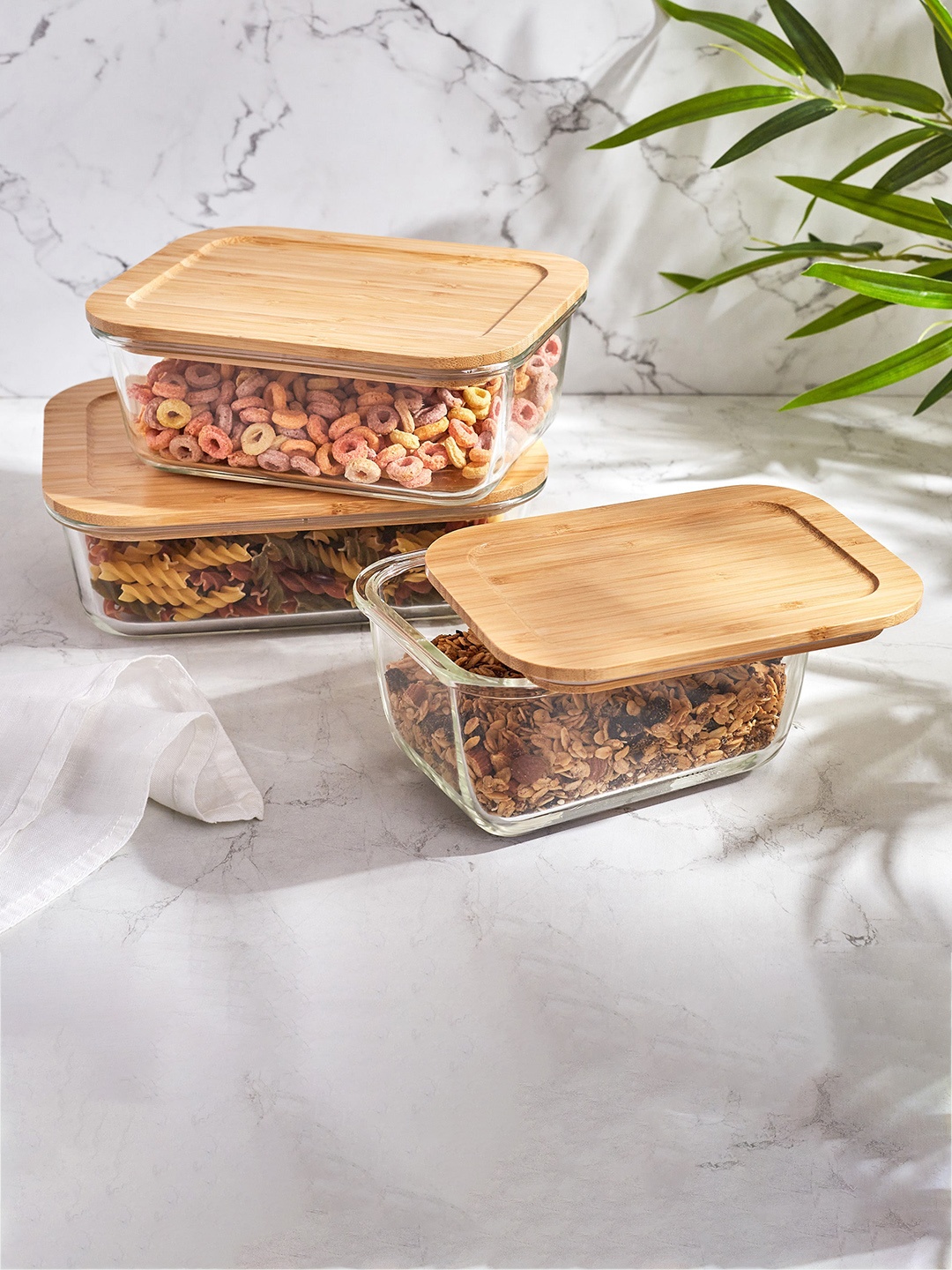 

Home Centre Palestine Frisson Transparent Glass Canister With Bamboo Lid 1.52 L