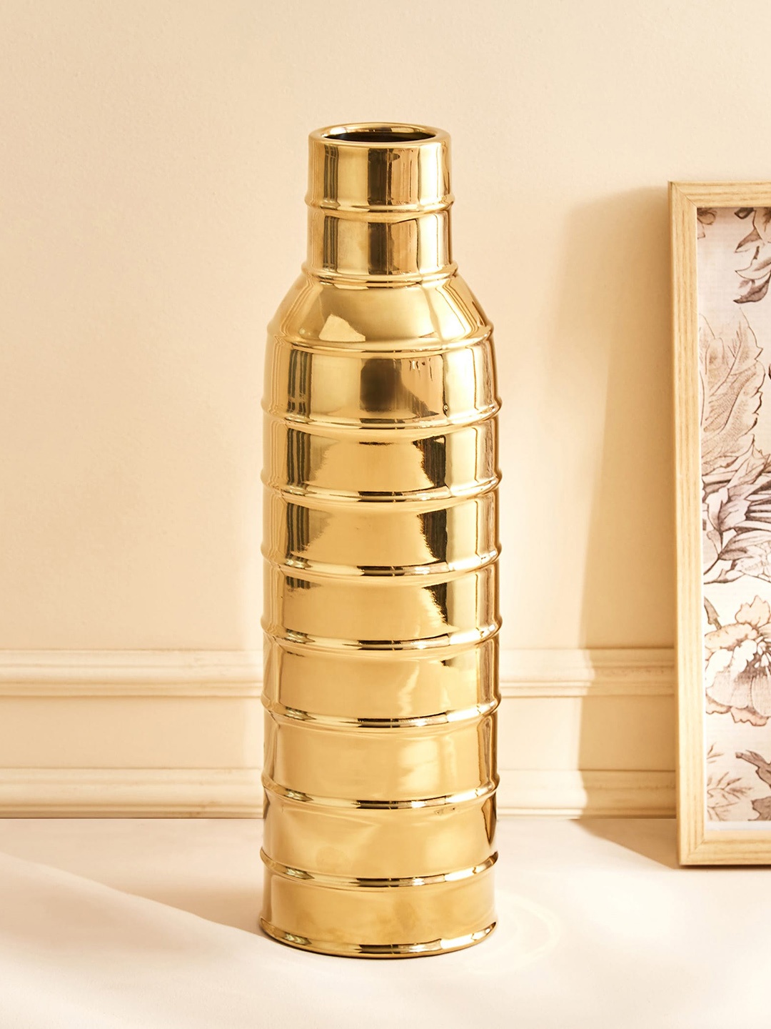

Home Centre Stellar Celestial Gold Toned Porcelain Vase