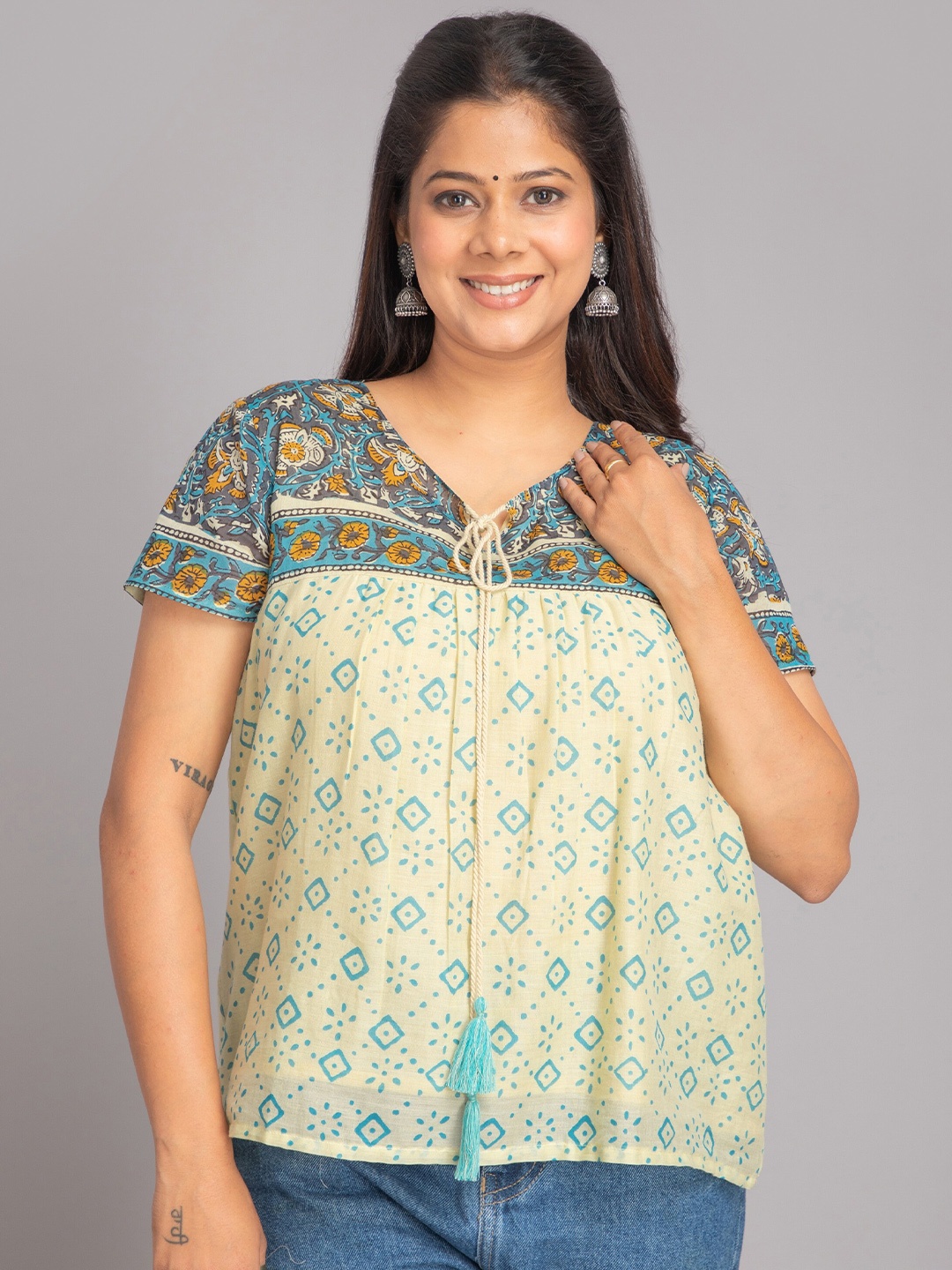 

SUTI Ethnic Motifs Printed Tie-Up Neck Cotton Top, Cream