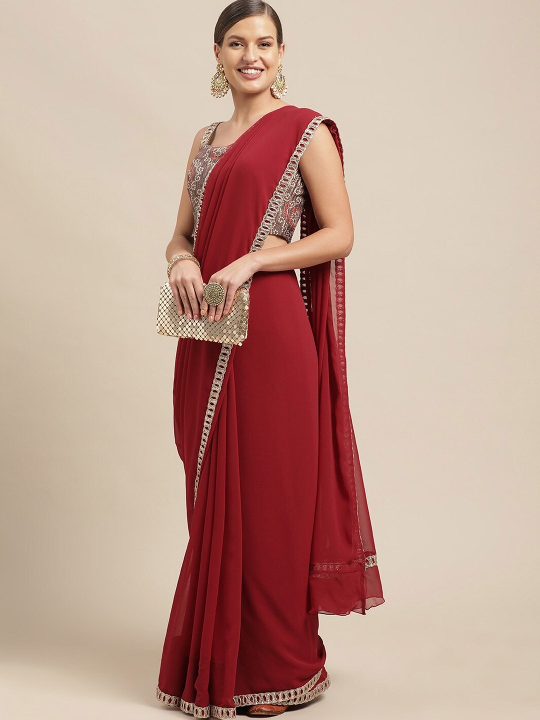 

Ethnovog Solid Poly Georgette Saree, Maroon