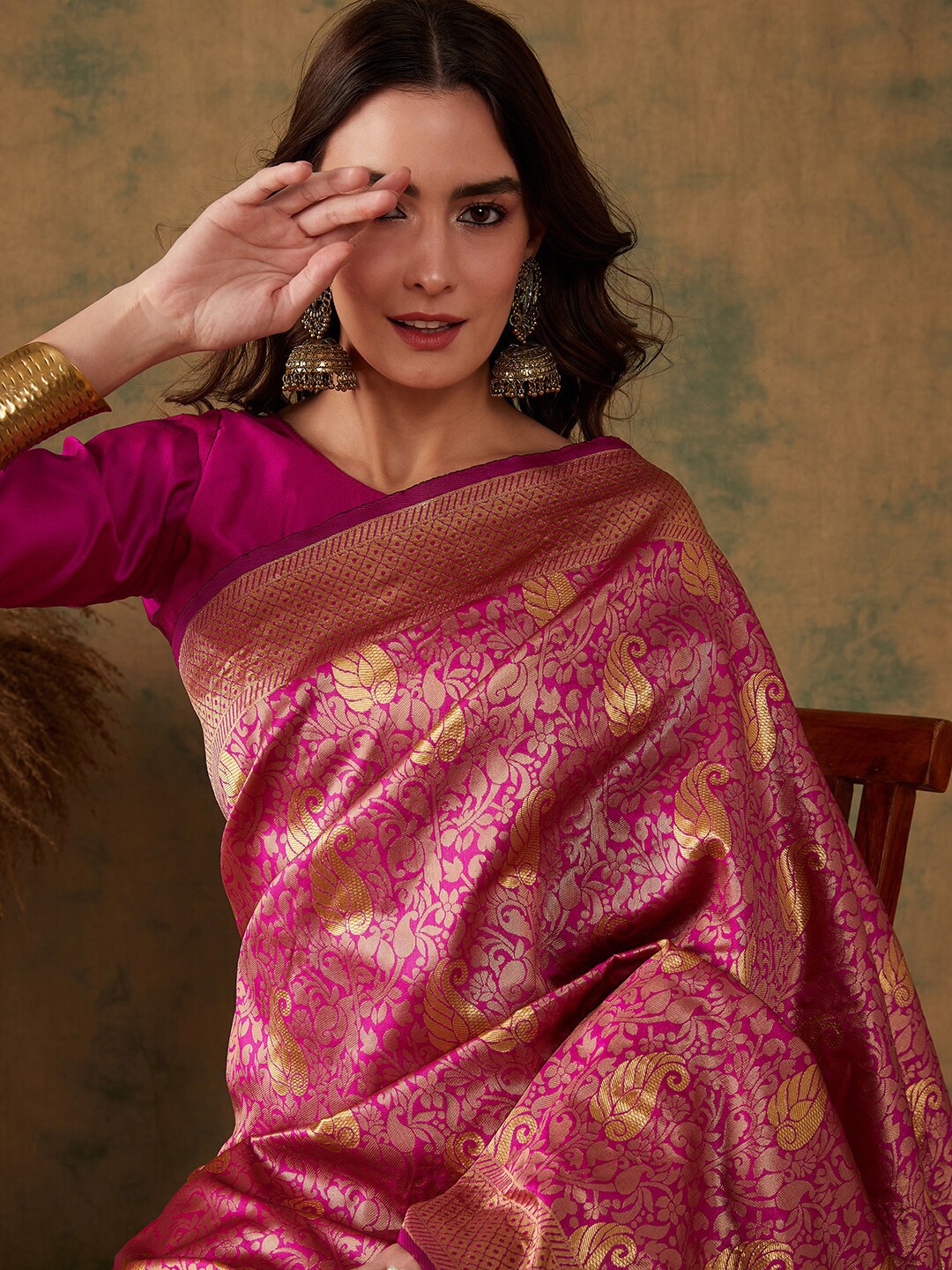 

Sangria Pink & Gold Toned Ethnic Motifs Woven Design Zari Banarasi Saree