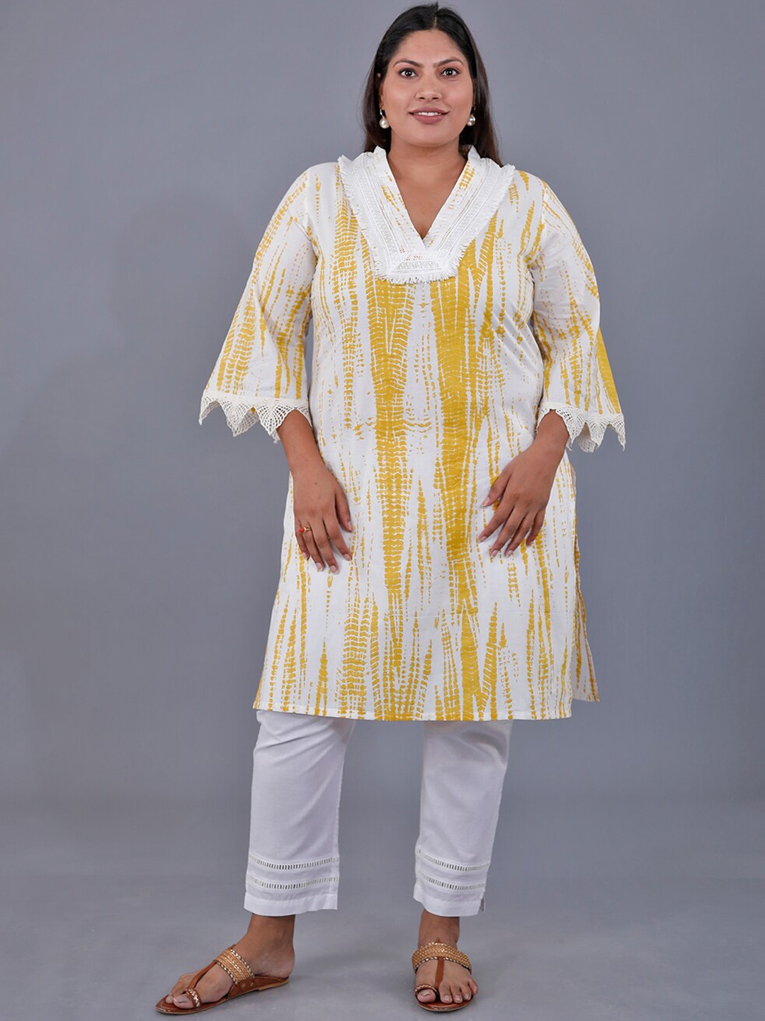 

Fabnest Curve Abstract Printed V-Neck Pure Cotton Kurta with Trousers, Yellow