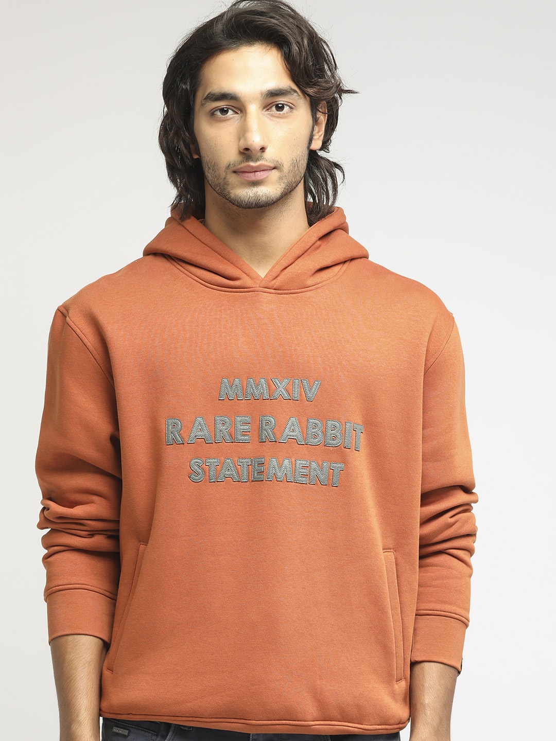 

RARE RABBIT Men Ether Typography Printed Hooded Sweatshirt, Rust