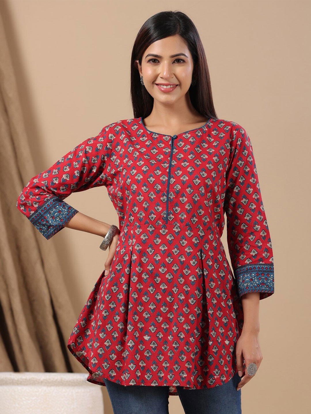 

Anubhutee Floral Printed Pure Cotton Pleated A-Line Kurti, Maroon