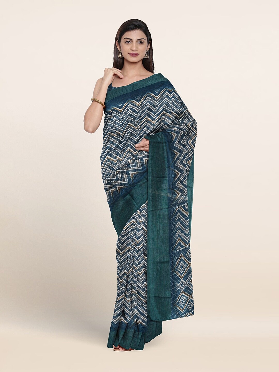 

Pothys Abstract Printed Zari Saree, Teal