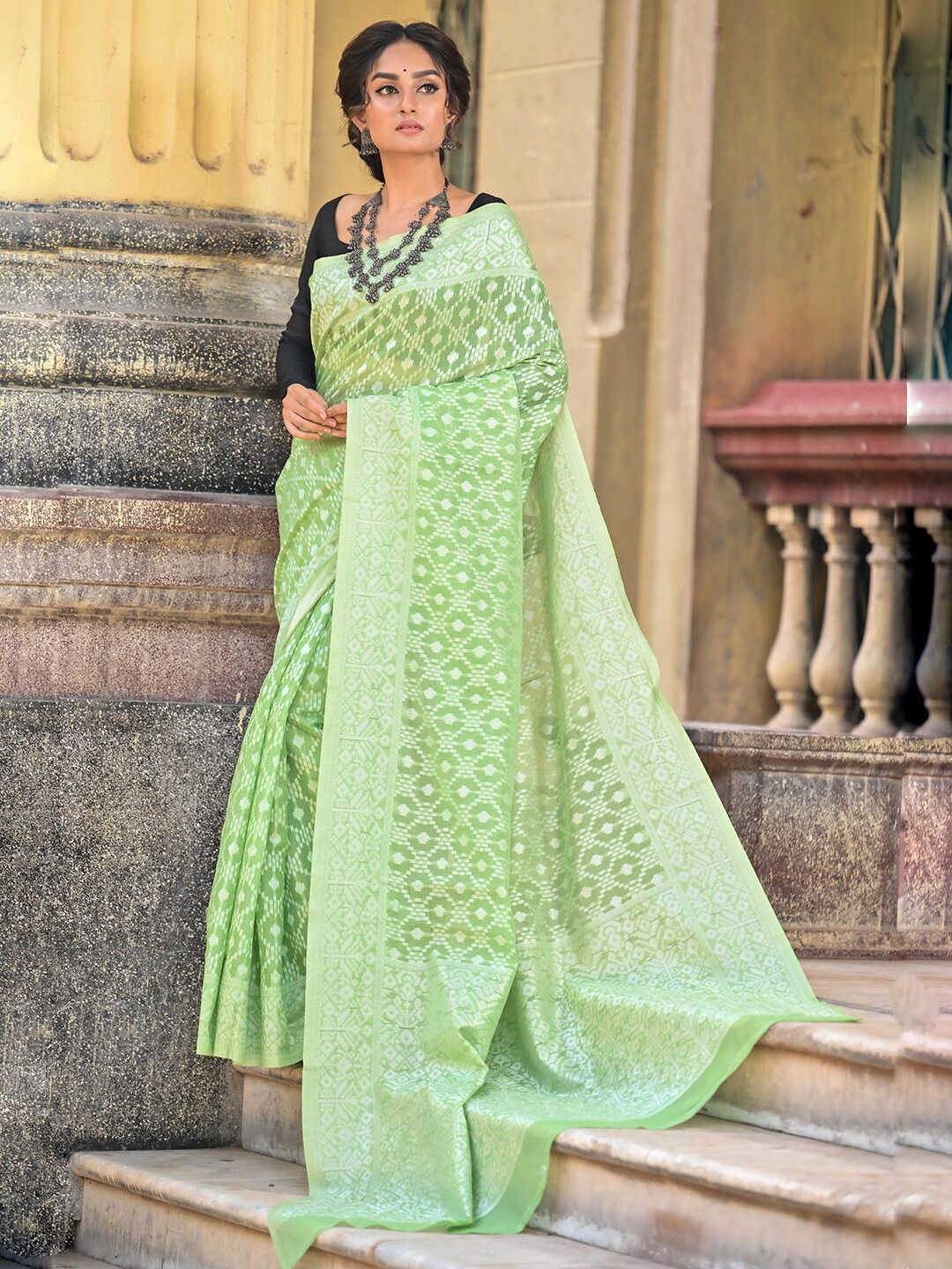 

Anouk Lime Green & Silver-Toned Ethnic Motifs Woven Design Zari Pure Cotton Chanderi Saree