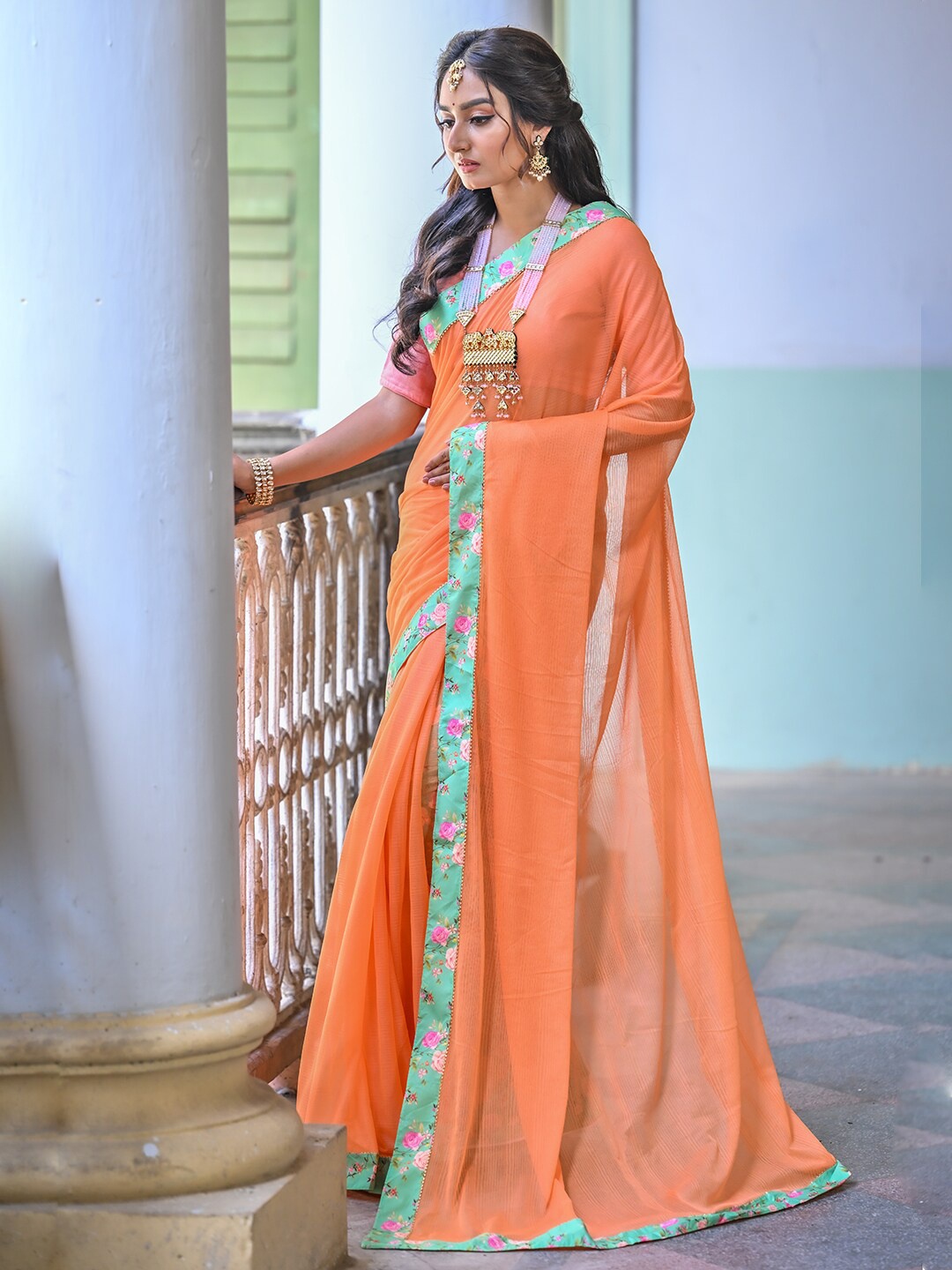 

Anouk Orange Floral Printed Border Saree