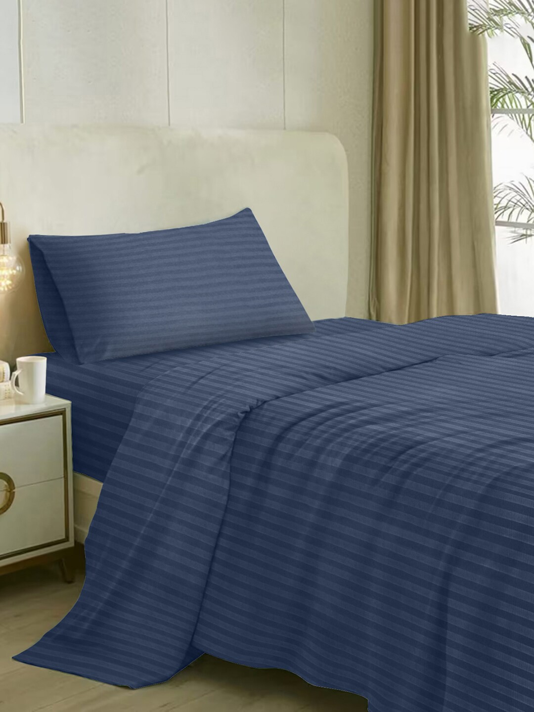 

Naksh Blue Striped Cotton 210 TC Single Bedsheet with 1 Pillow Cover