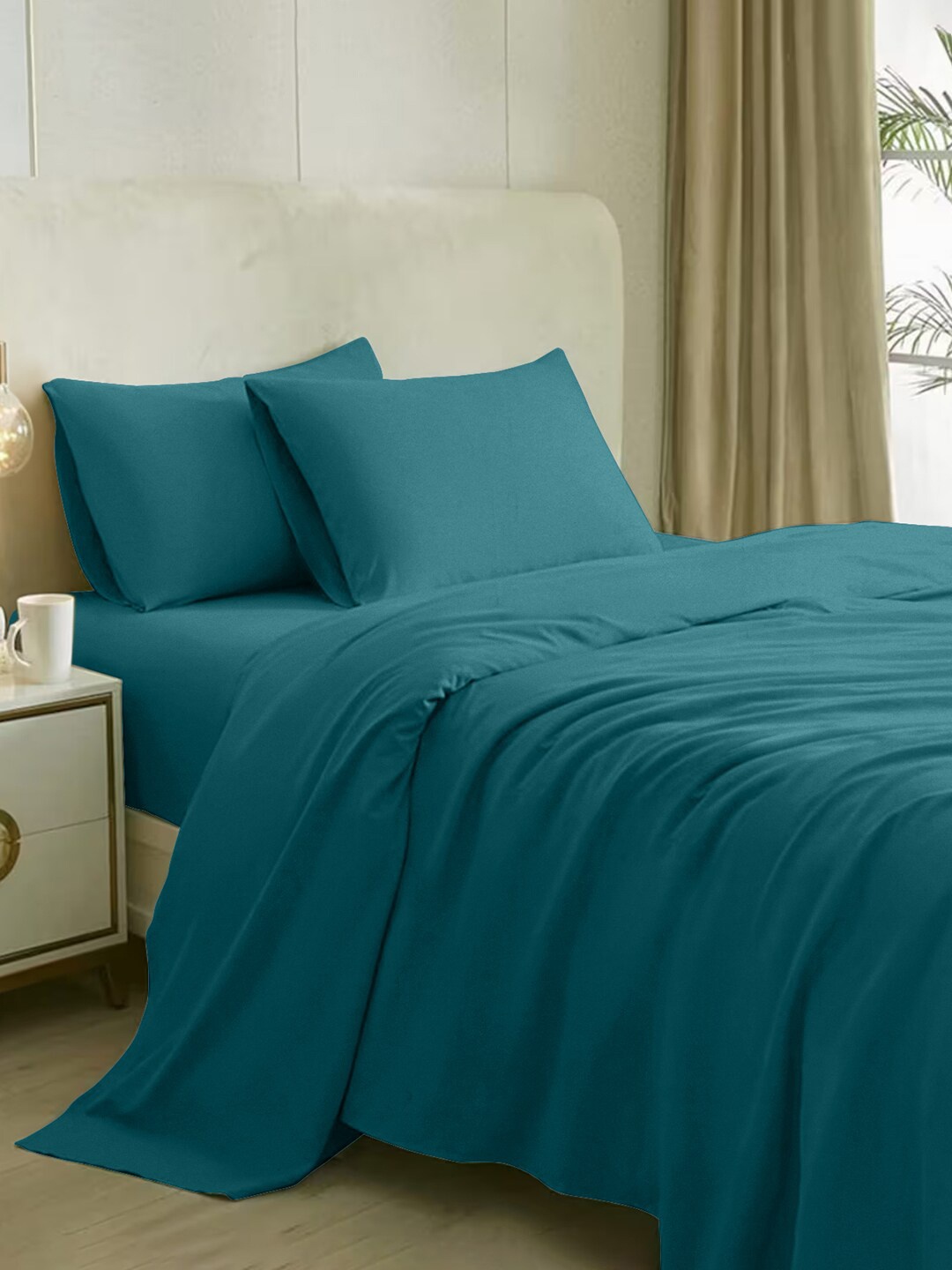 

Naksh Teal Cotton 210 TC Queen Bedsheet With 2 Pillow Covers