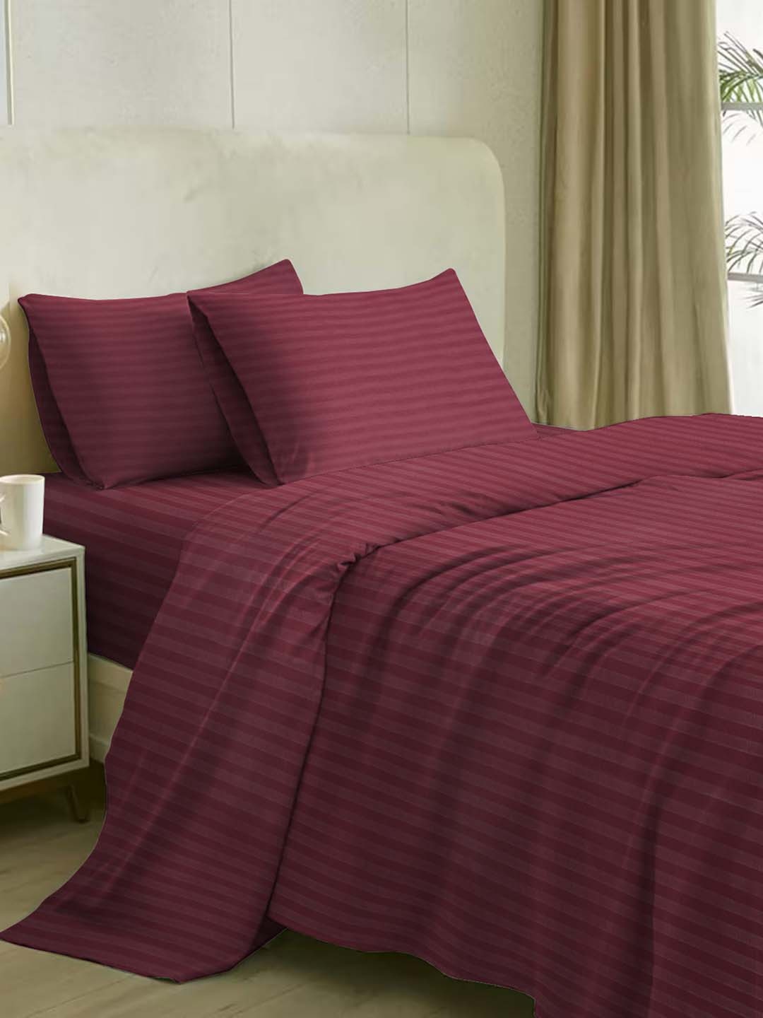 

Naksh Maroon Striped 210 TC Cotton Queen Bedsheet with 2 Pillow Covers