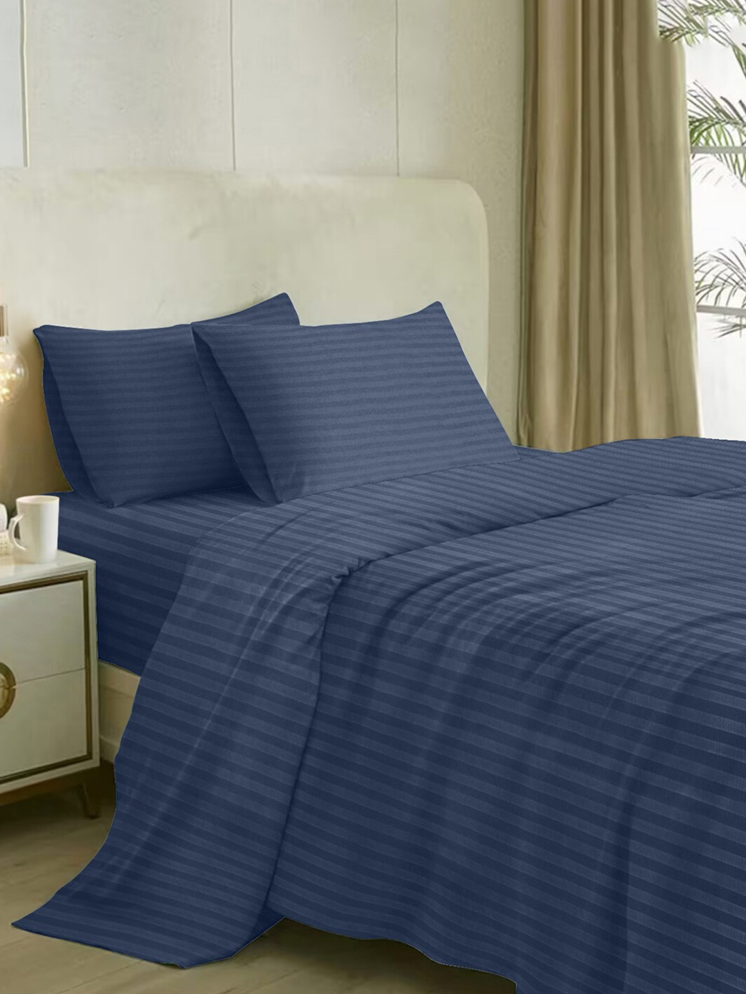 

Naksh Blue Striped Cotton 210 TC Queen Bedsheet with 2 Pillow Covers