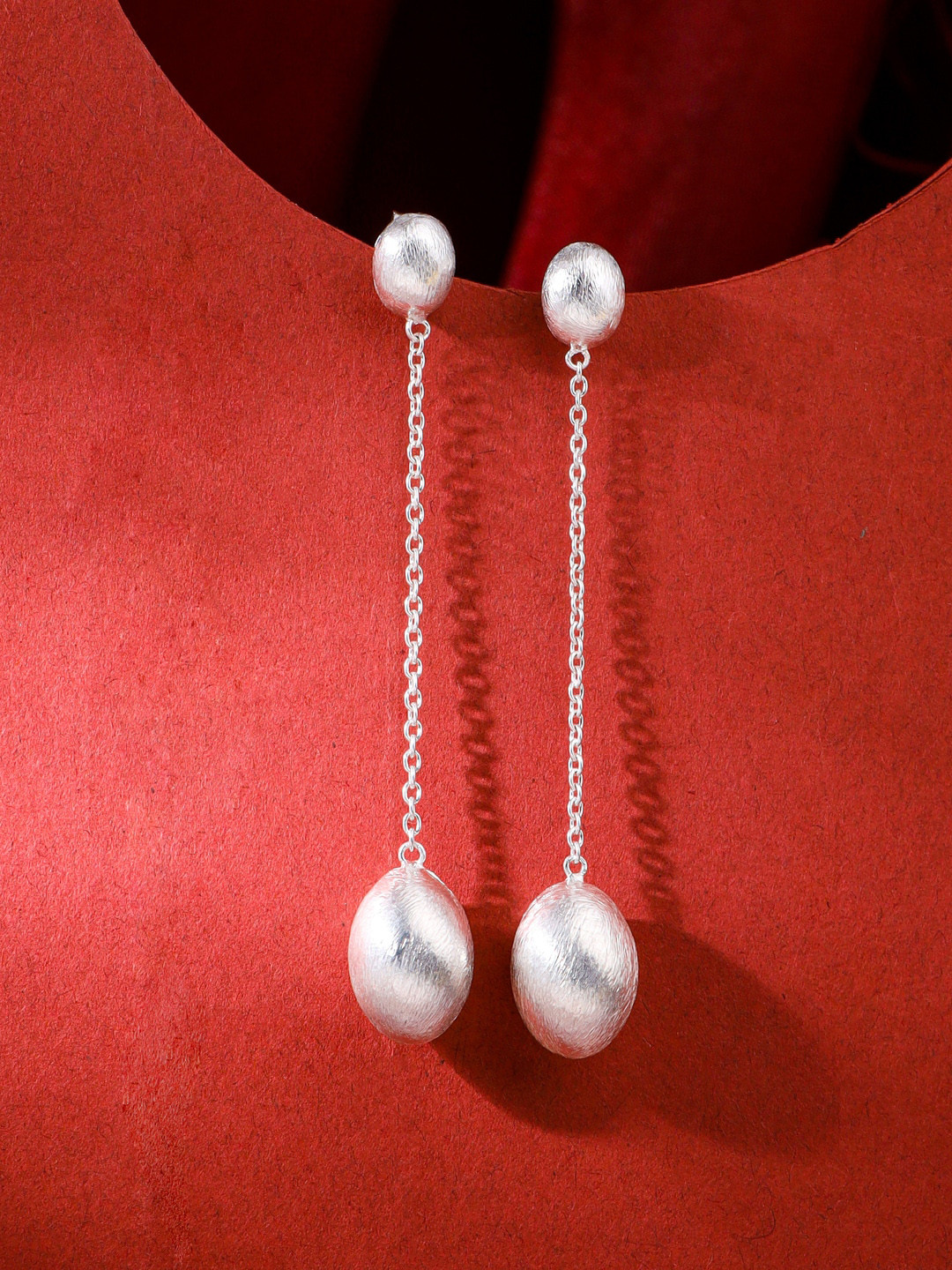 

Kicky And Perky Silver-Toned Oval Drop Earrings