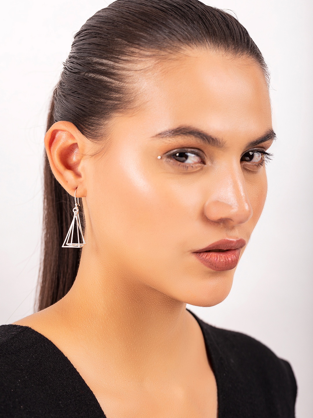 

Kicky And Perky Silver-Toned Triangular Drop Earrings