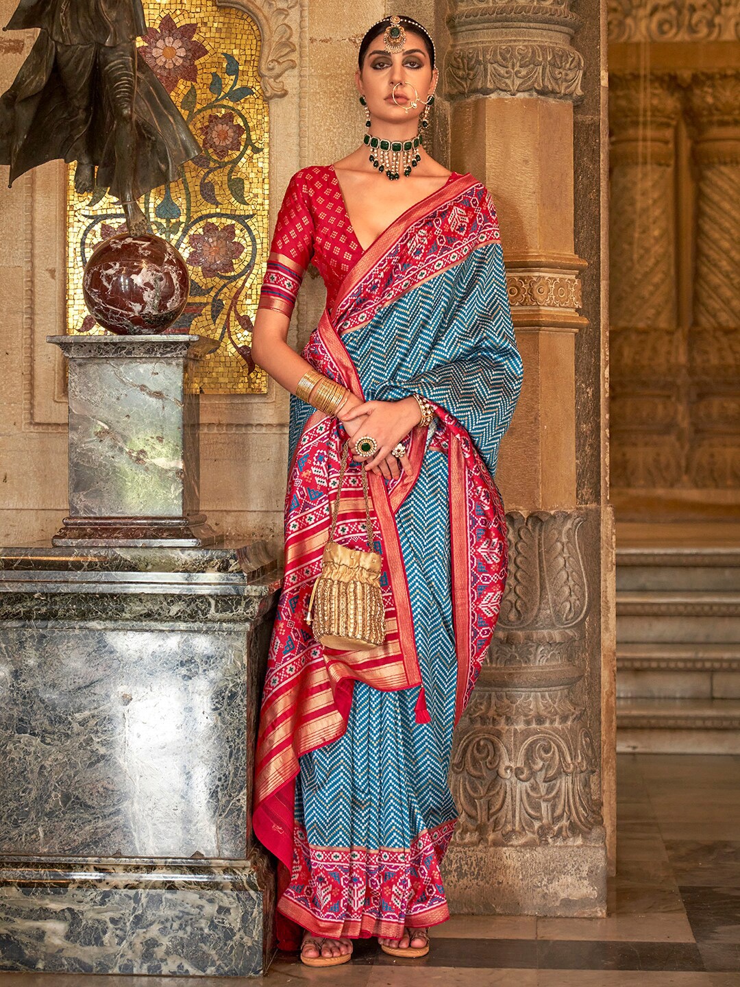 

Anouk Blue & Pink Ethnic Motifs Woven Design Zari Silk Blend Ikat Saree