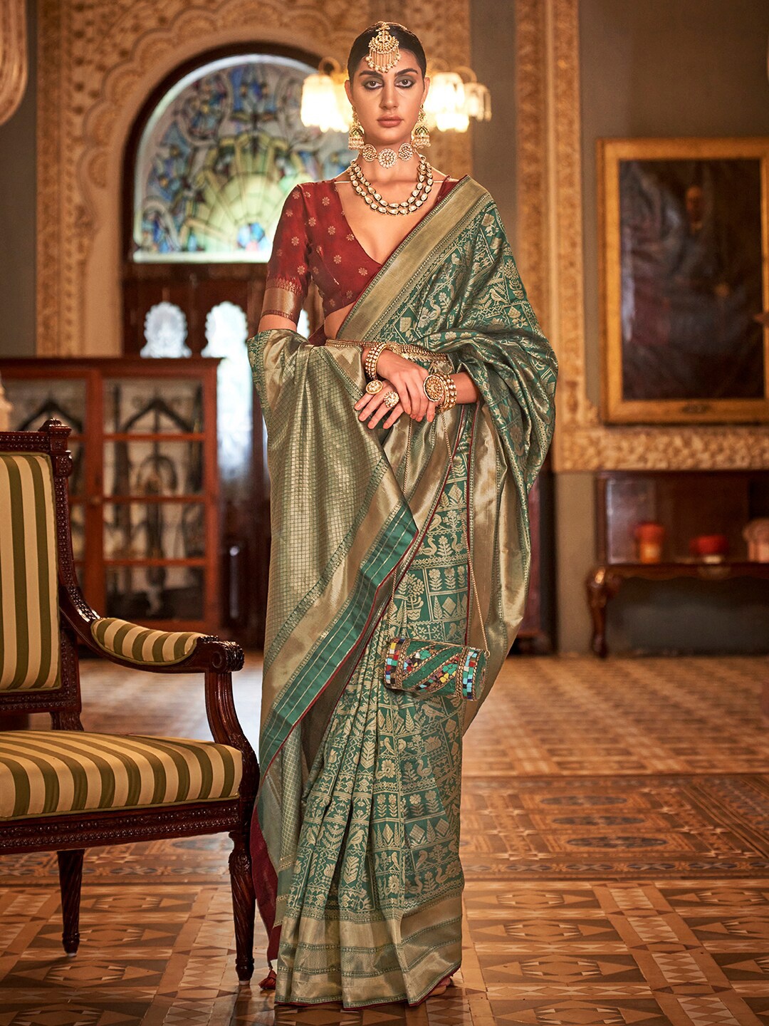 

Anouk Teal Green & Maroon Ethnic Motifs Woven Design Zari Banarasi Saree