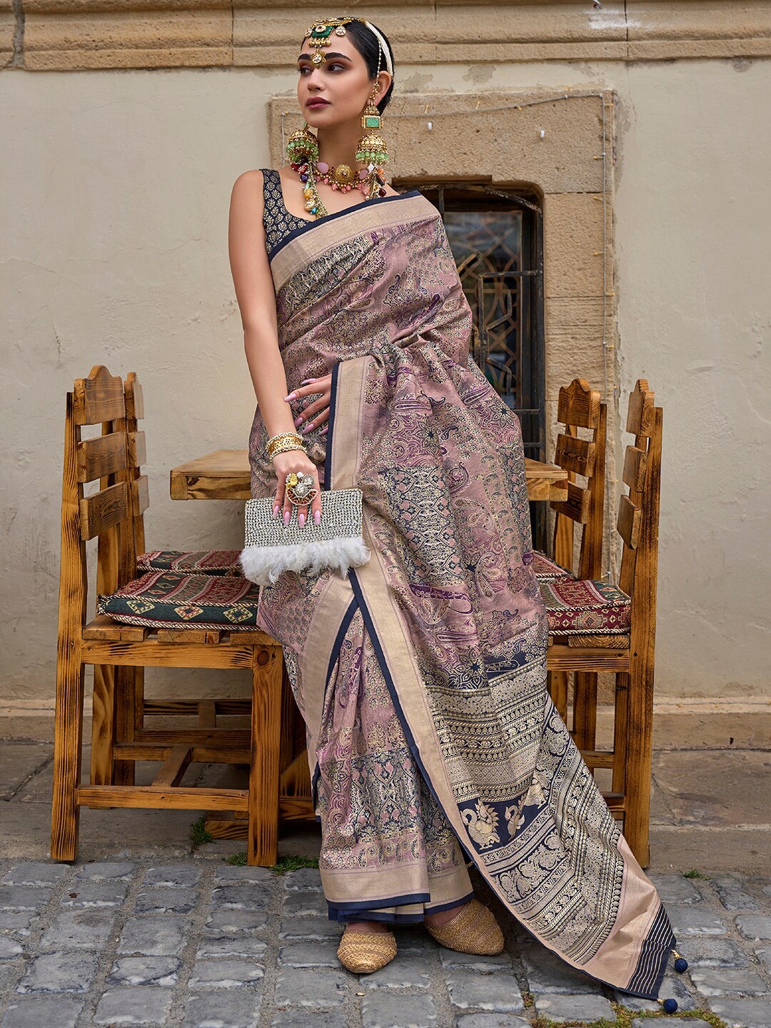 

Anouk Ethnic Motifs Woven Design Zari Dabu Saree, Mauve