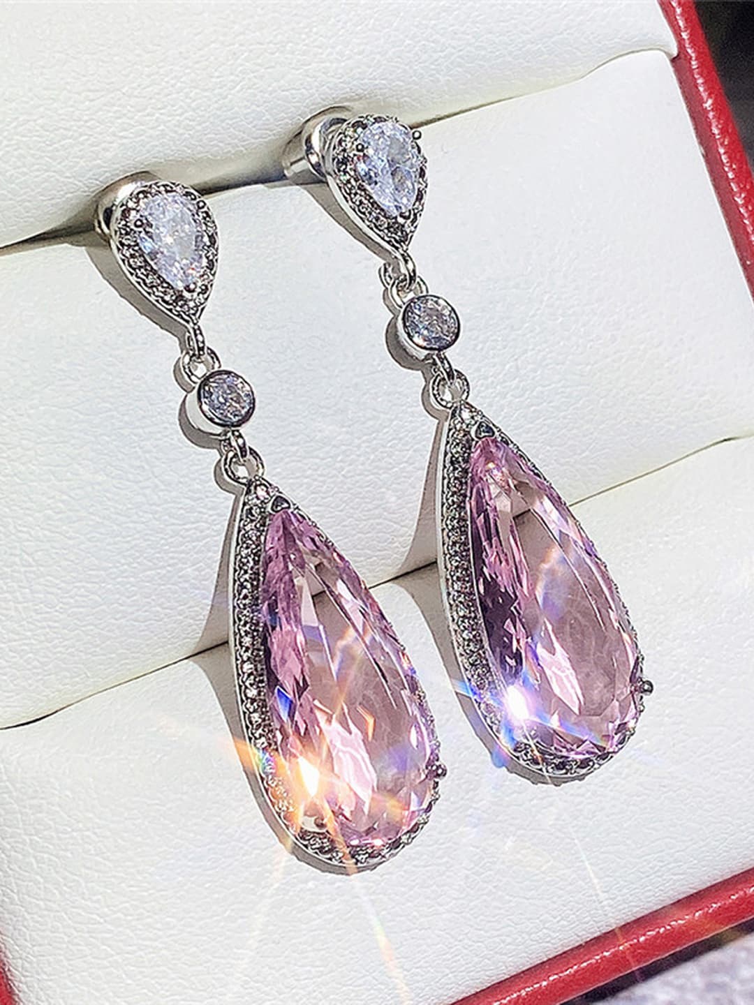 

Designs & You Pink Teardrop Shaped Drop Earrings