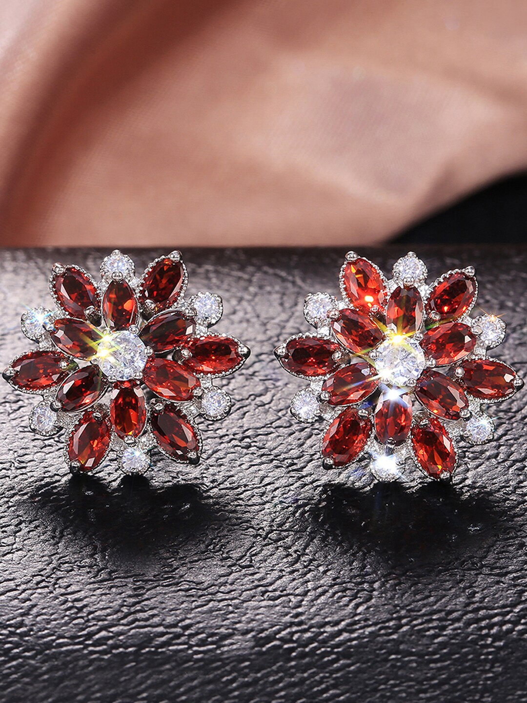 

Designs & You Silver-Plated Floral American Diamond Studs Earrings, Red