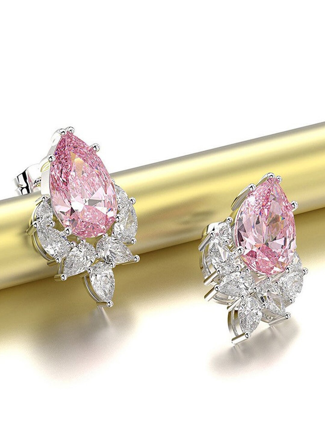 

Designs & You Silver Plated American Diamond Teardrop Shaped Studs Earrings, Pink