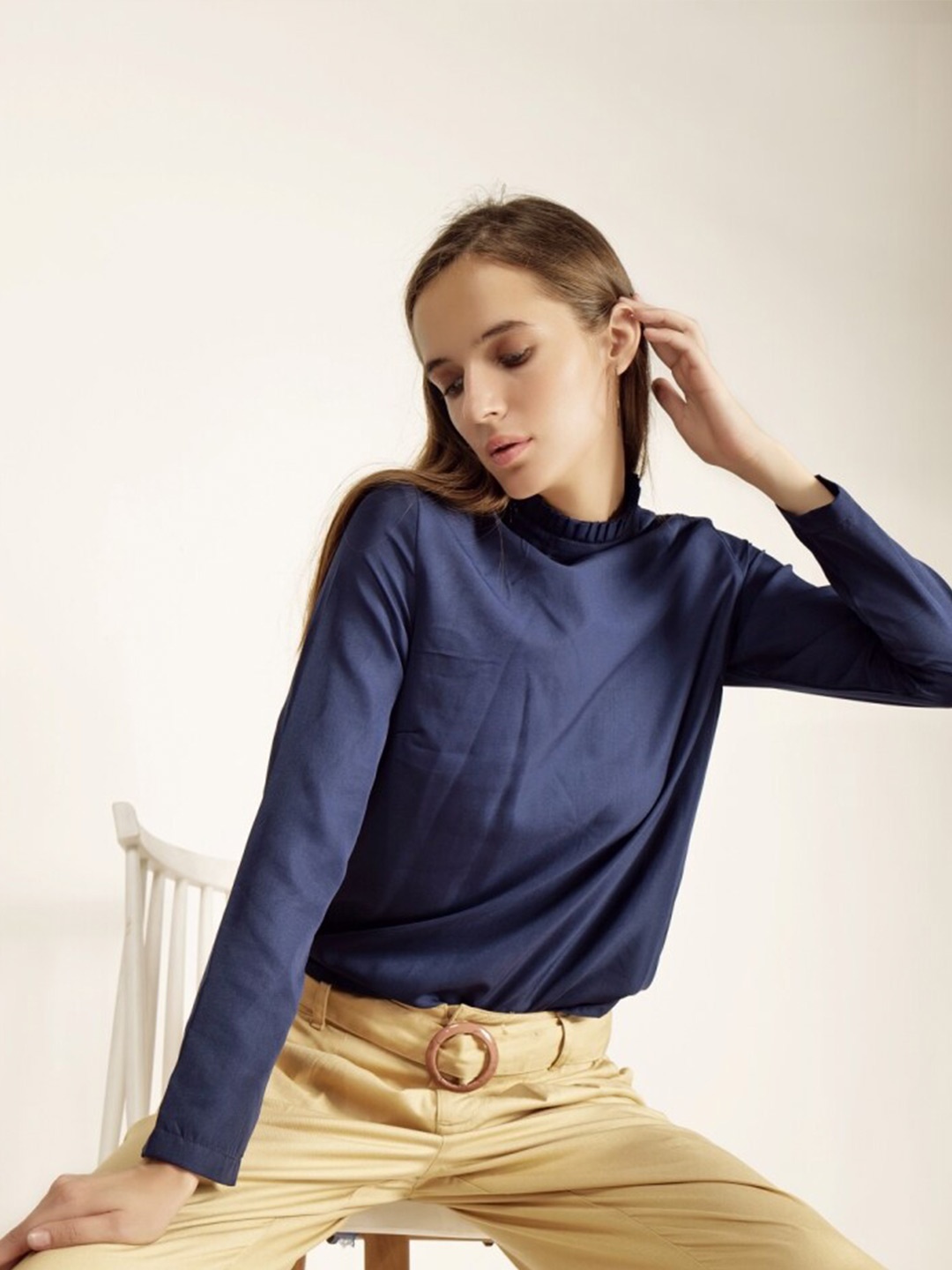 

INVICTUS High Neck Puff Sleeves Cut Out Styled Back Top, Navy blue