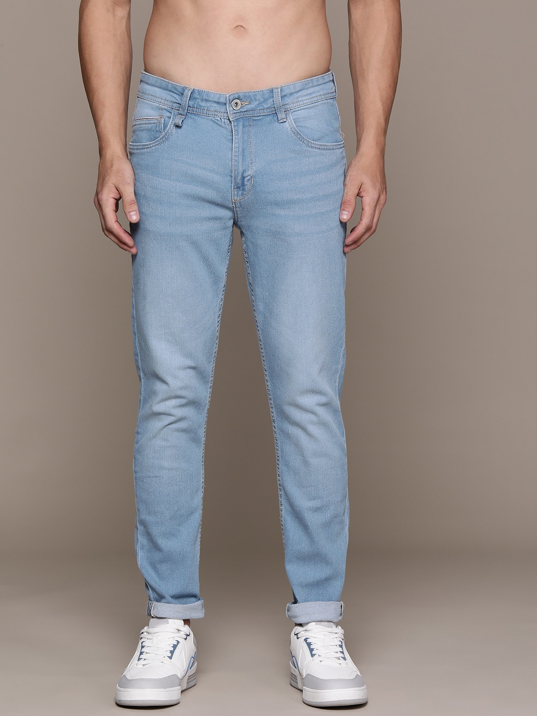 

The Roadster Lifestyle Co. Men Tapered Fit Light Fade Jeans, Blue