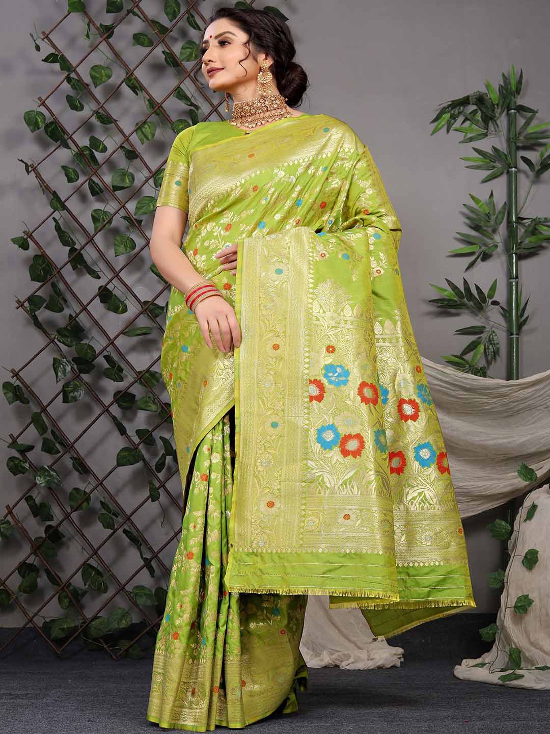 

Mitera Green Ethnic Motifs Woven Designed Zari Saree