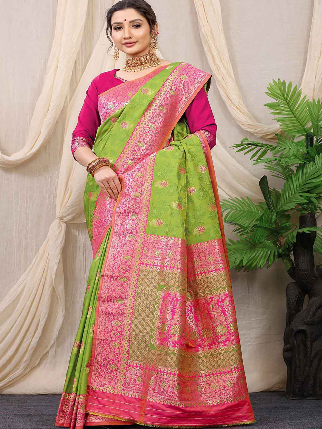 

Mitera Green & Pink Woven Design Zari Art Silk Saree