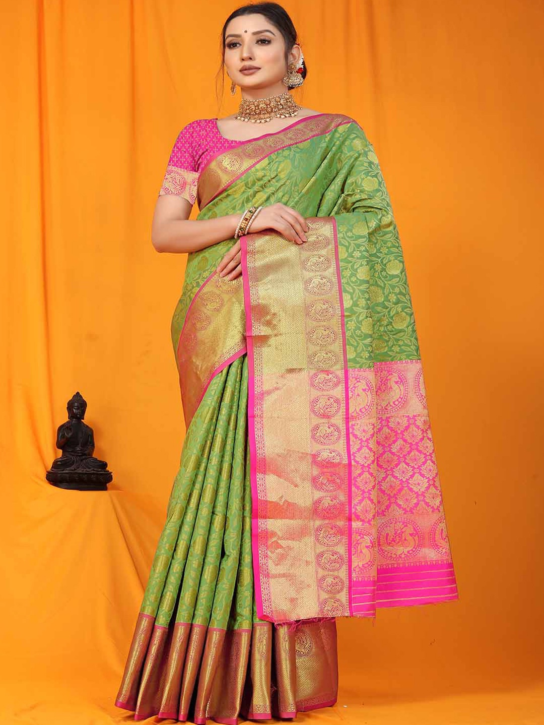 

Mitera Green & Pink Woven Design Zari Art Silk Saree