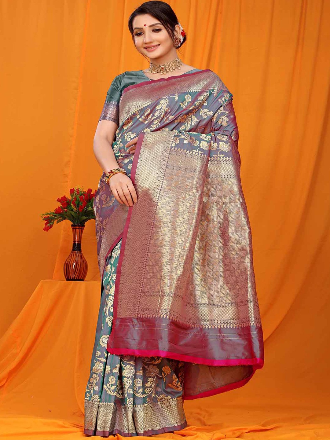 

Mitera Green & Gold Woven Design Zari Art Silk Saree