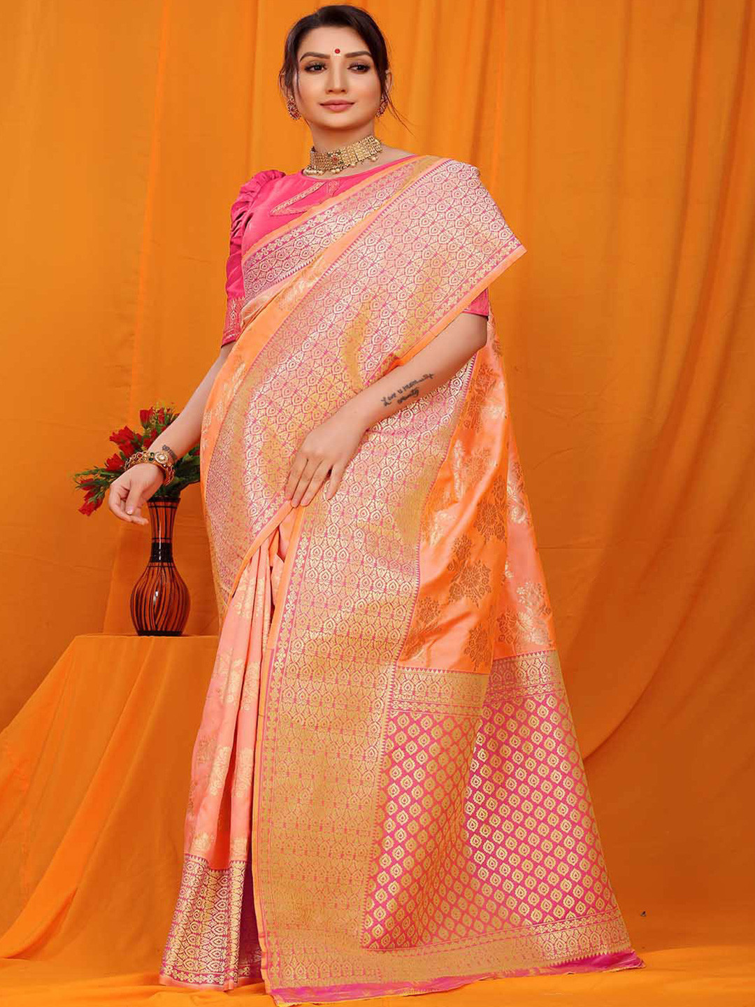 

Mitera Peach-Coloured & Gold-Toned Ethnic Motifs Woven Design Zari Art Silk Saree