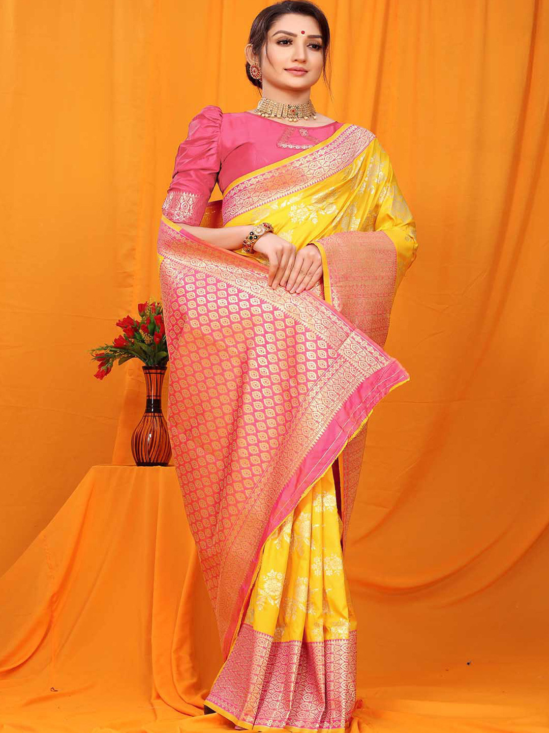 

Mitera Yellow & Pink Floral Woven Design Zari Art Silk Saree