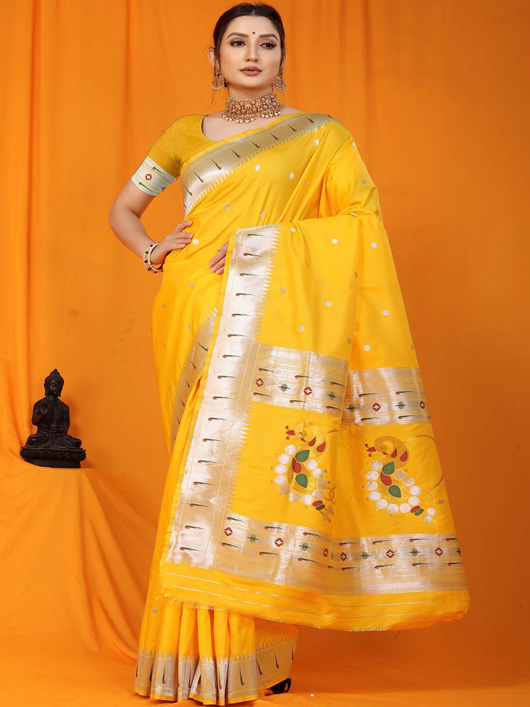 

Mitera Yellow & Red Ethnic Motifs Woven Design Zari Art Silk Saree
