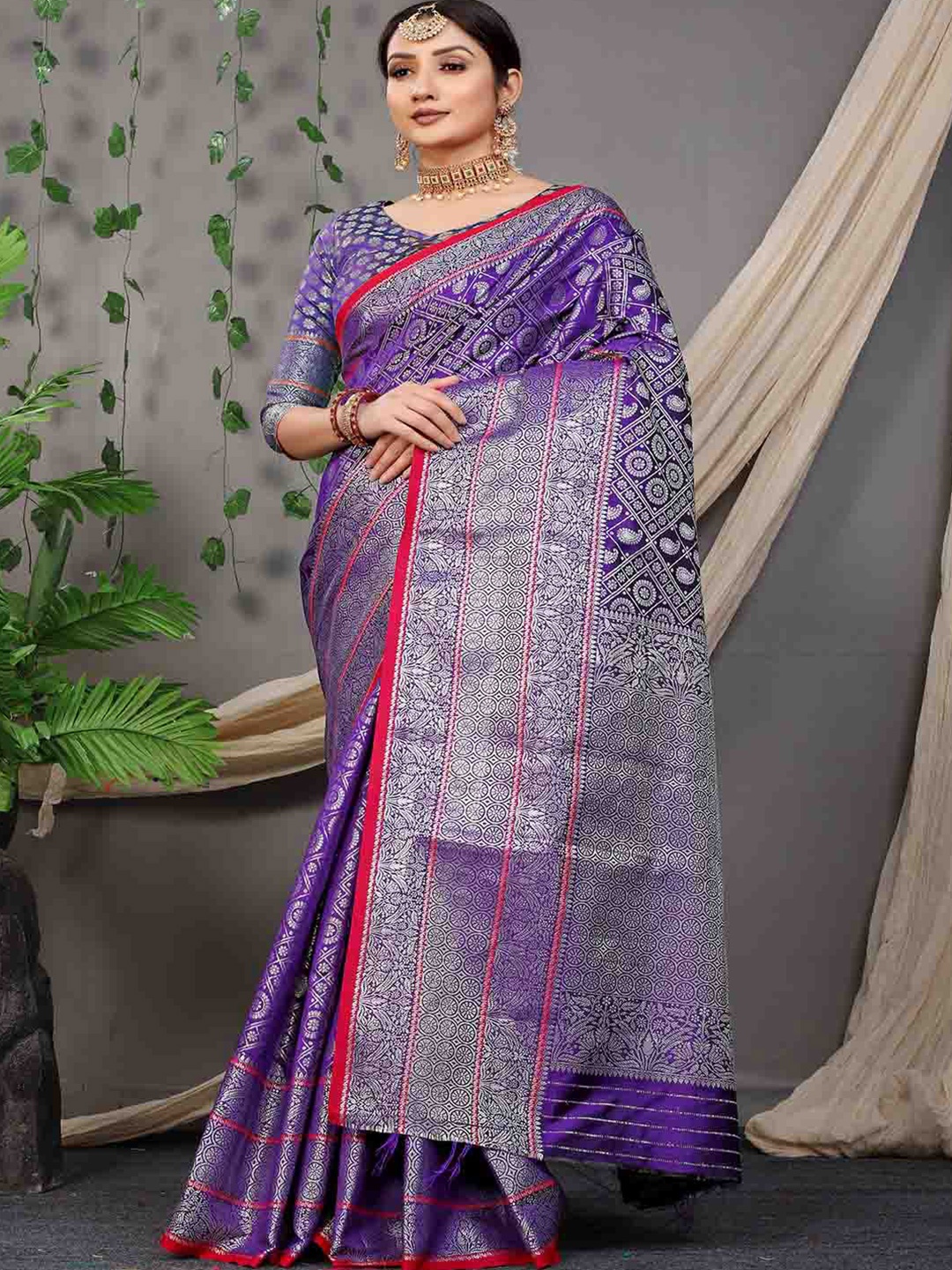 

Mitera Purple & Silver-Toned Ethnic Motifs Woven Design Zari Art Silk Saree