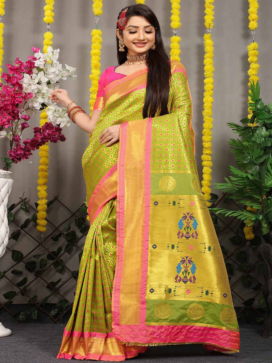 

Mitera Green & Pink Ethnic Motifs Woven Design Zari Saree