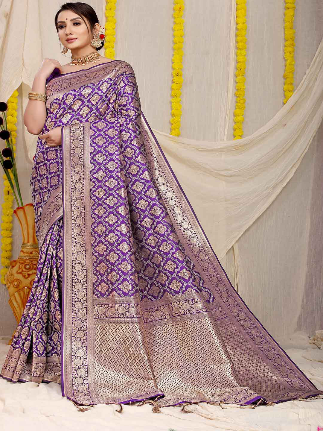 

Mitera Purple and Gold-Toned Ethnic Motifs Woven Design Zari Saree