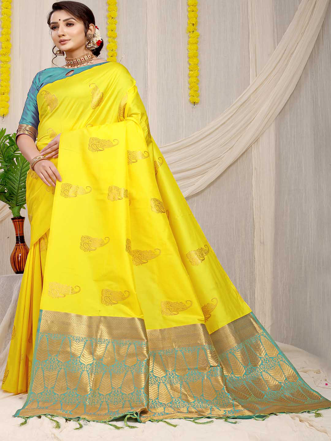 

Mitera Yellow & Blue Paisley Woven Design Zari Saree