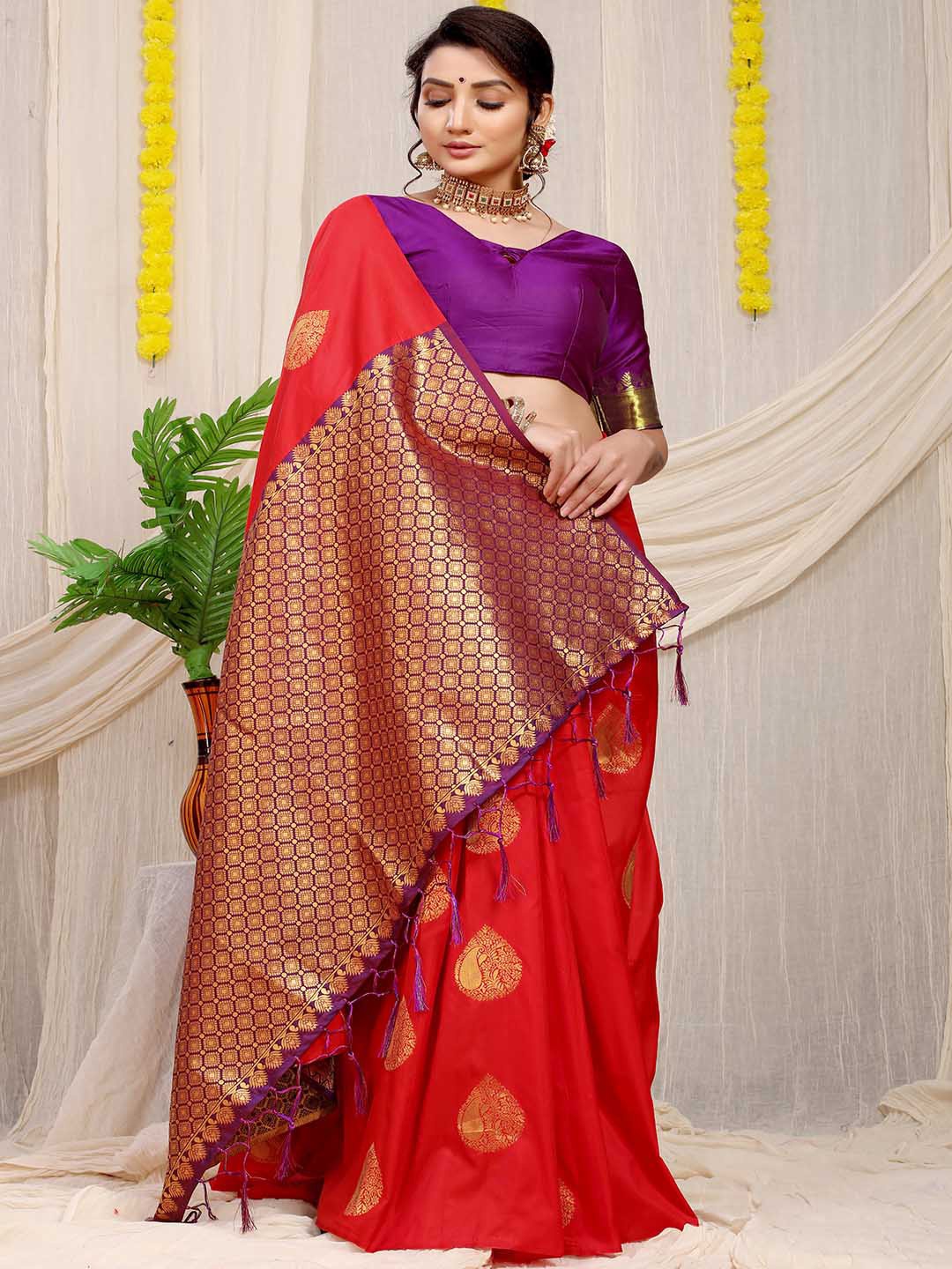 

Mitera Red & Purple Ethnic Motifs Woven Design Zari Saree