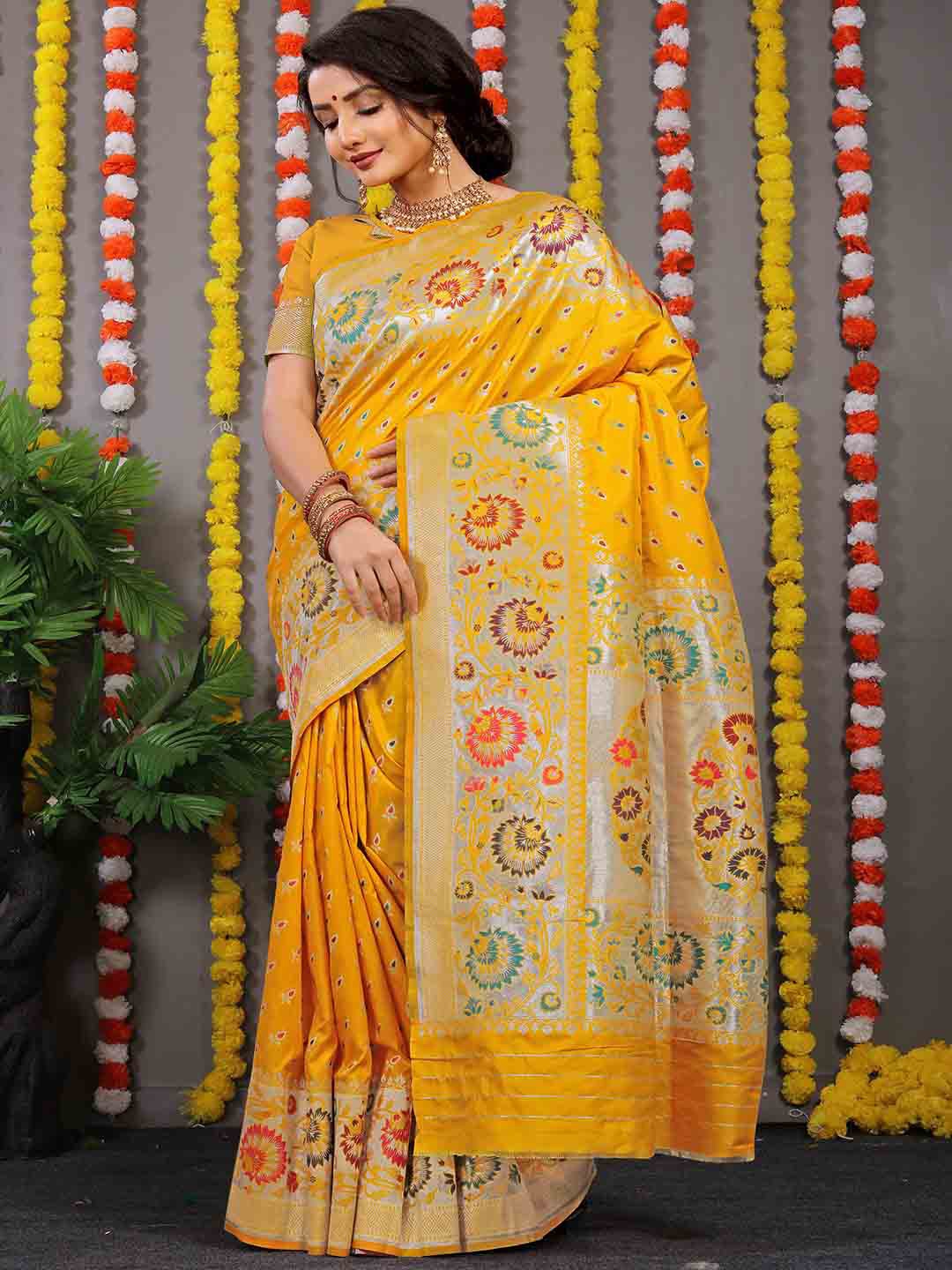 

Mitera Yellow and Green Ethnic Motifs Woven Design Zari Saree