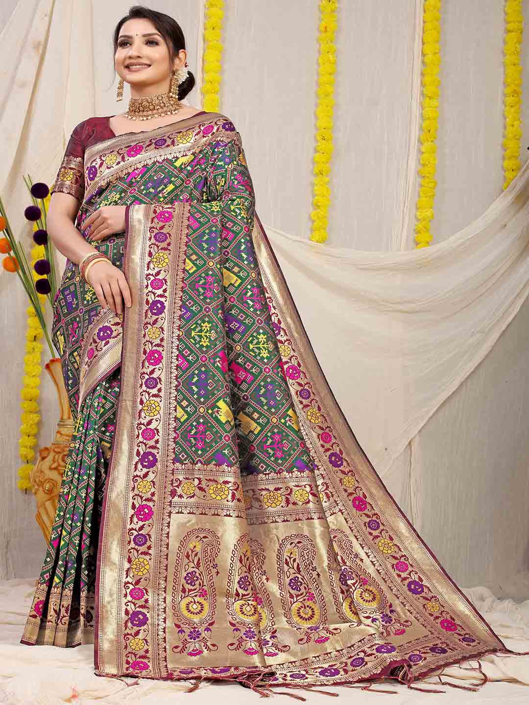 

Mitera Green & Maroon Ethnic Motifs Woven Design Zari Saree