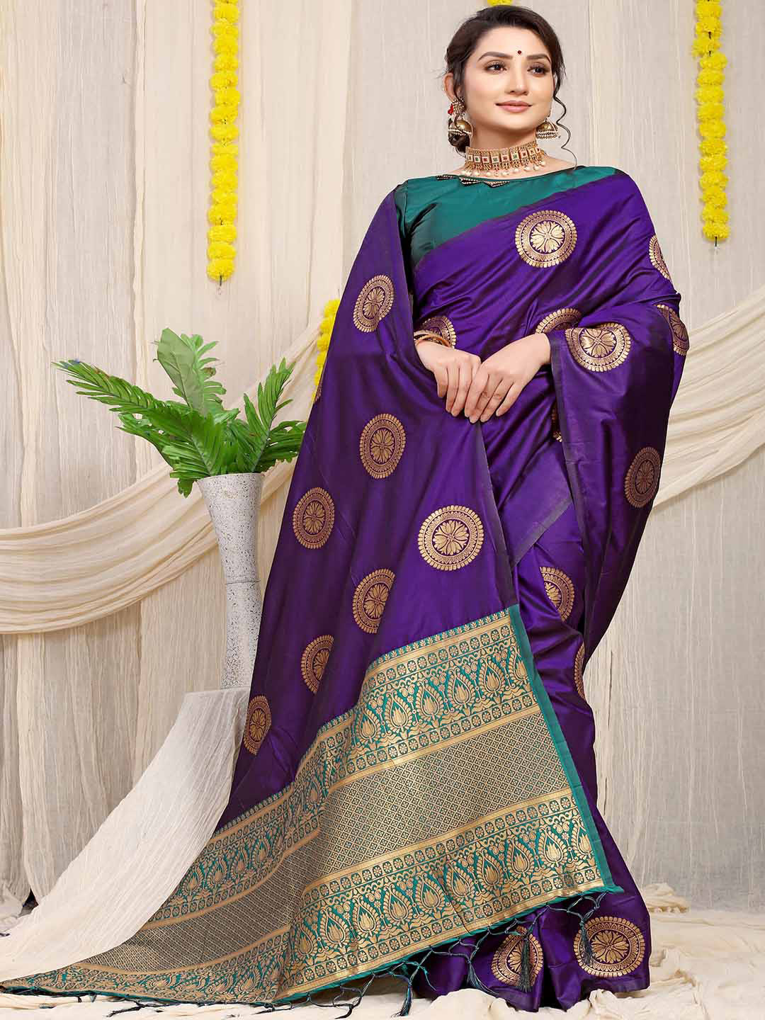 

Mitera Purple & Blue Ethnic Woven Design Zari Saree