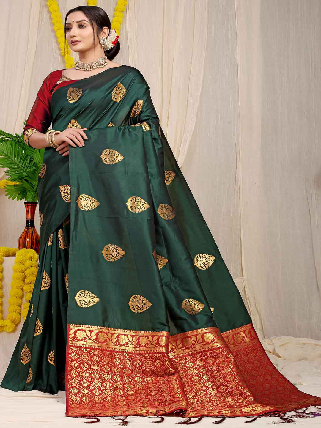

Mitera Green & Red Ethnic Woven Design Zari Saree