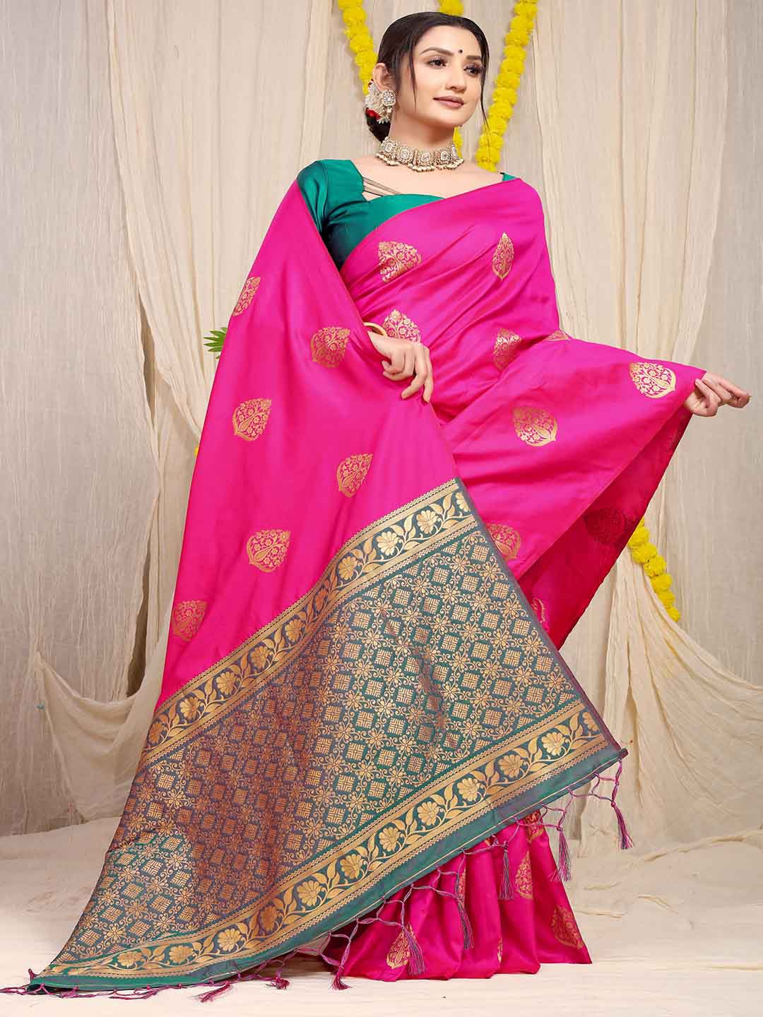 

Mitera Pink & Green Ethnic Motifs Zari Art Silk Saree