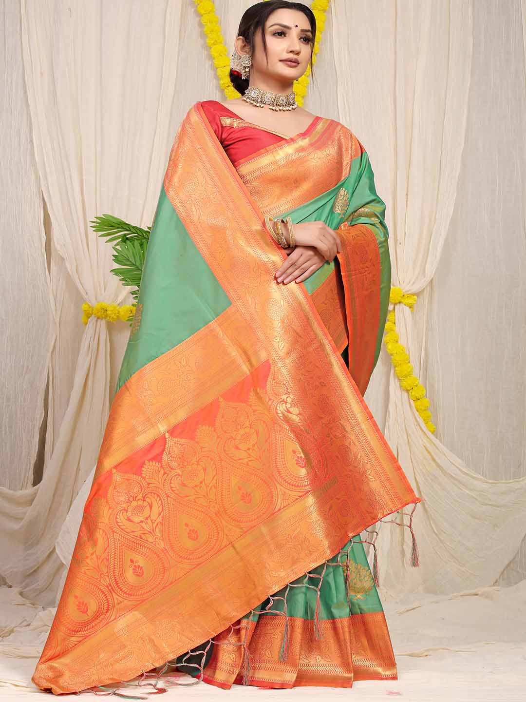 

Mitera Green & Red Ethnic Motifs Woven Design Zari Saree