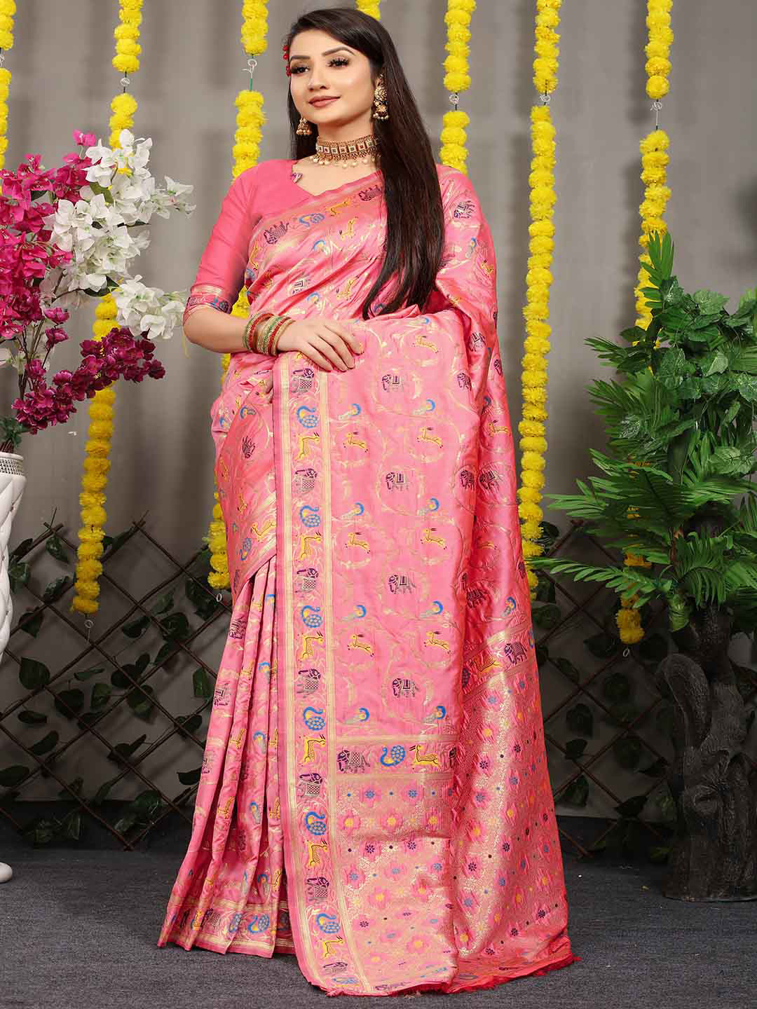 

Mitera Pink & Gold-Toned Ethnic Motifs Woven Design Zari Saree