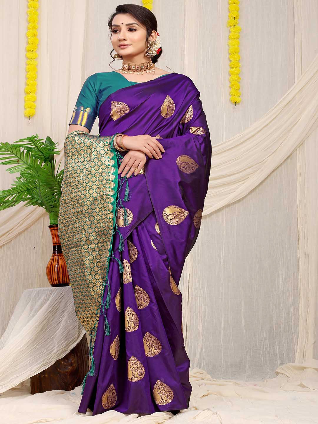

Mitera Violet & Green Ethnic Motifs Woven Design Zari Saree