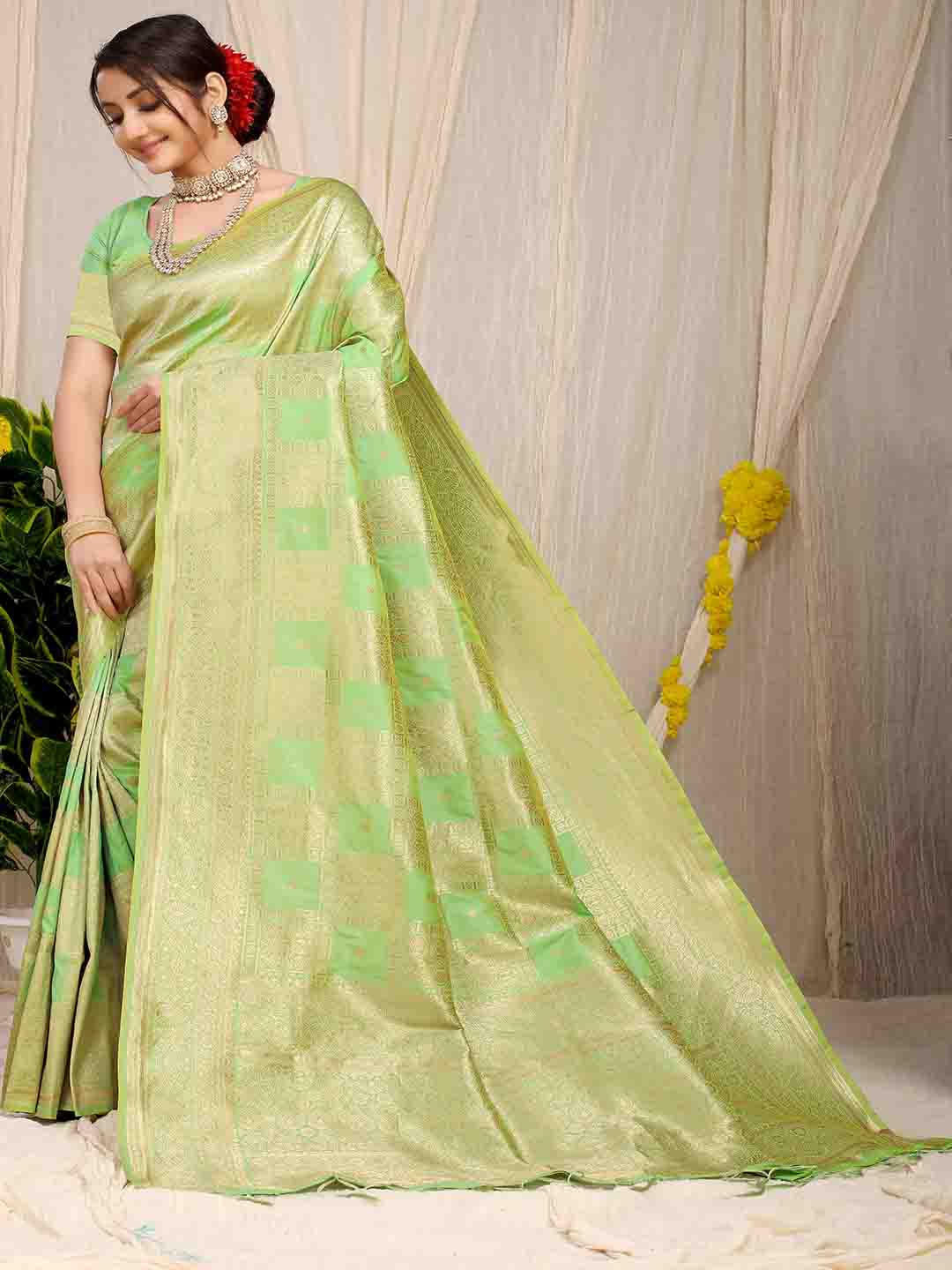 

Mitera Green & Gold-Toned Ethnic Motifs Woven Design Zari Art Silk Saree