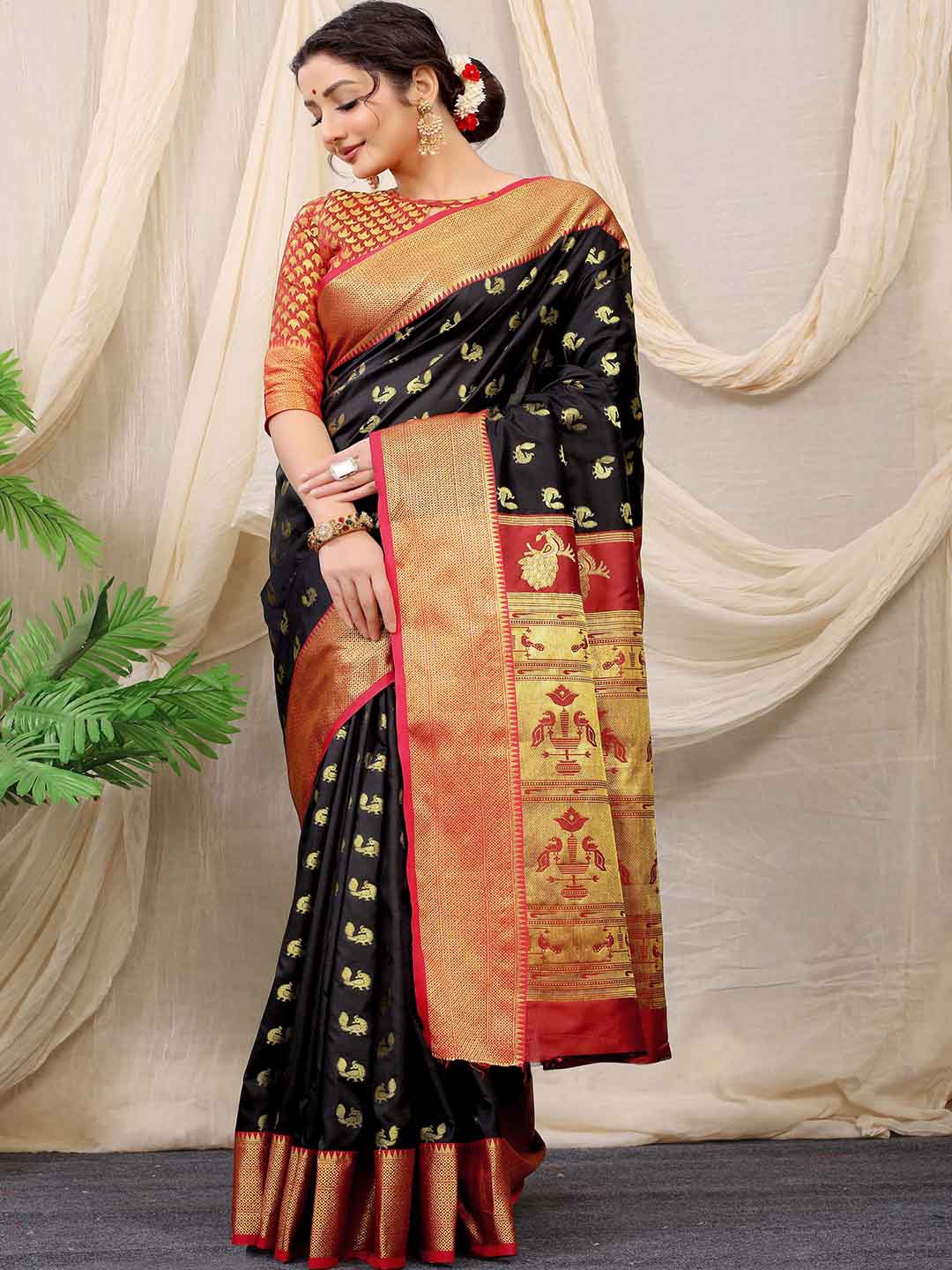 

Mitera Black & Pink Ethnic Motifs Woven Design Zari Saree