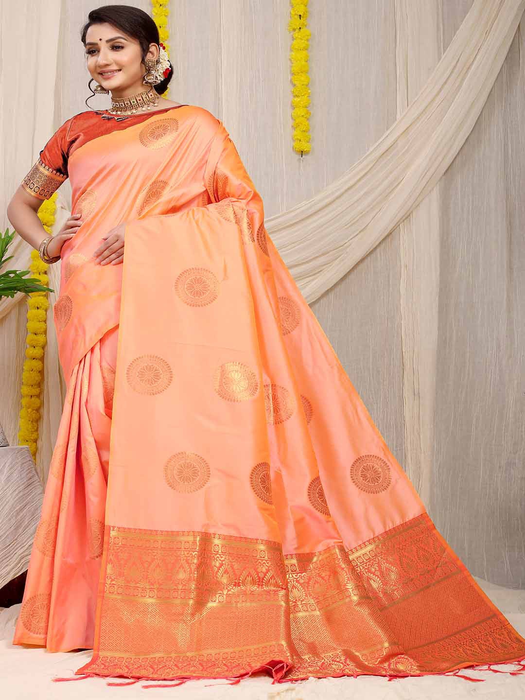 

Mitera Peach-Coloured & Gold-Toned Ethnic Motifs Woven Design Zari Saree