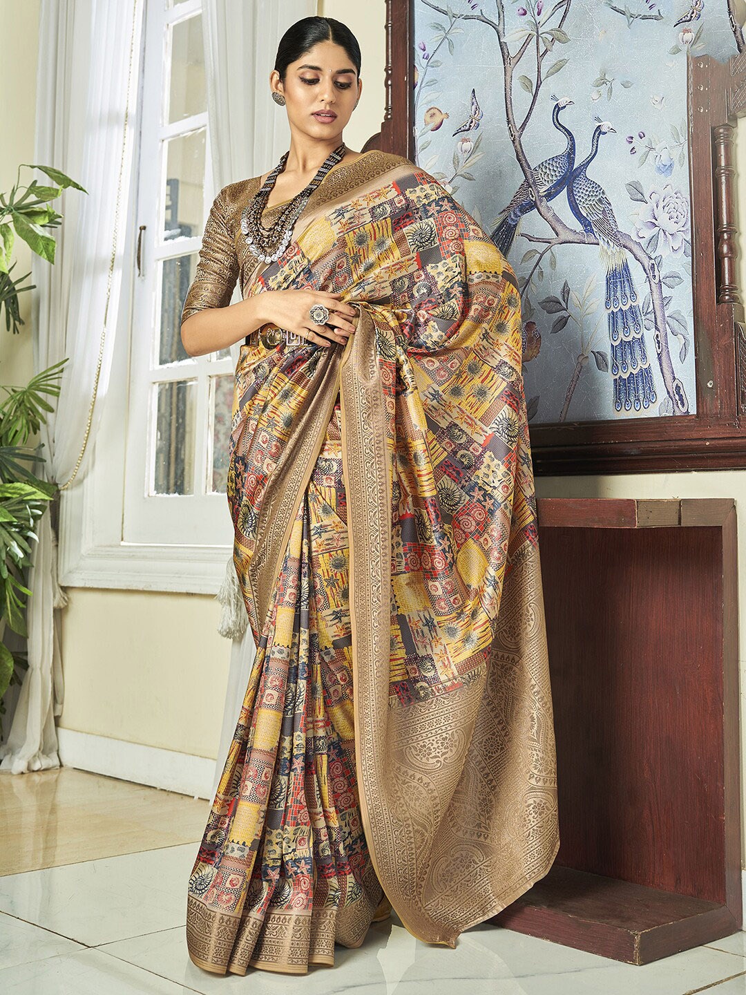 

Satrani Ethnic Motifs Printed Zari Saree, Yellow